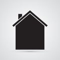 Carved silhouette flat icon, simple vector design. House with roof and chimney for illustration of housing and dwelling. Symbol o Royalty Free Stock Photo