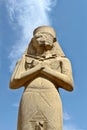 Carved statue of pharaoh Ramses II situated at Karnak Temple Royalty Free Stock Photo