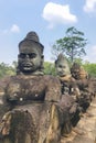 Carved Statues Walkway at Angkor Wat Ancient Ruins