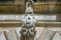carved stone corbel or mascaron that supports Royalty Free Stock Photo