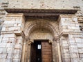 The carved stone entrance of an ancient Italian medieval church Royalty Free Stock Photo