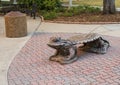 Carved stone `horned frog` bench on the campus of Texas Christian University.