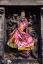 Carved stone idol of Goddess Mahishasur Mardini slaying the demon buffalo. Nataraja Temple. Chidambaram, Tamil Nadu, India