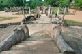 Carved stone stairways and ccolumns of broken Buddha temples from 12th century, Polonnaruwa, Sri Lanka. UNESCO Site