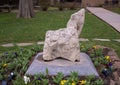 Carved stone untitled sculpture in a garden at the Catholic Church of Saint John the Baptist in Edmond, Oklahoma.