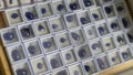 Carved stones of blue sapphires in the showcase of a jewelry store Royalty Free Stock Photo