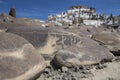 Carved stones and small city in Ladakh, India