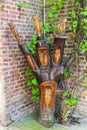 Carved tree trunk in Bedburg-Kaster, Germany