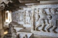 Carved warriors inside of the Adinatha temple,  a Jain temple in Ranakpur, Rajasthan, India Royalty Free Stock Photo