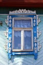 Carved window of a russian wooden house