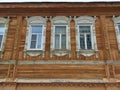 Carved windows of old wooden house in Kineshma, Russian town on Volga river. Royalty Free Stock Photo