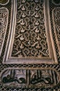 Carved wooden arch element in El Bahia Palace.