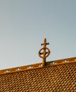 Medieval wooden cross on a church with Celtic carvings Royalty Free Stock Photo