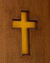 Carved wooden cross on a church door Royalty Free Stock Photo