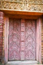 The carved wooden door of Baan Phor Liang Meun Terracotta Arts hotel, on May 4 in Chiang Mai, Thailand