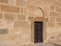 A carved wooden door in the Tower of the Great Mosque in Kairouan. Royalty Free Stock Photo