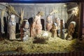 Carved wooden Nativity scene with Jesus at Christmas time