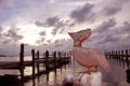 A carved wooden pelican looking out over Blackwater Sound in Key Largo Royalty Free Stock Photo