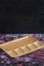 Carved wooden platters with pieces on them