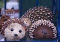 Carved wooden porcupines