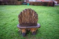 Carved wooden seat from the front