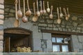 Carved wooden souvenirs, spoons and toys on the veranda with brick columns on Sharambeyan street in Tufenkian Museum Old Dilijan