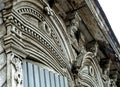 Carved wooden trim of the facade of the old house. House with carved wooden facade, Russia, southern Urals Royalty Free Stock Photo