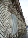 Carved wooden trim of the facade of the old house. House with carved wooden facade, Russia, southern Urals Royalty Free Stock Photo