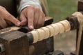 Carver at Work with Cutting Equipment during Medieval Country Festival