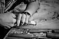 Carvers Hands work with chisel in workshop