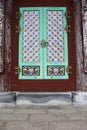 Carving art wooden window and antique wood door in ancient korean building and architecture of daeungjeon hall of Yonggung shrine Royalty Free Stock Photo