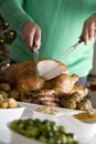 Carving Christmas Roast Turkey Royalty Free Stock Photo