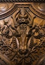 Carving of a Cow`s Head on a Wooden Door