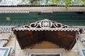 The carving decorative element of the entrance of the wooden house. Irkutsk streets, Russia