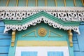 The carving decorative element of window of the wooden house. Irkutsk