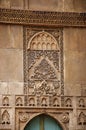 Carving details on the outer wall of the Sidi Sayeed Ki Jaali , Built in 1573, Ahmedabad, Gujarat, India Royalty Free Stock Photo
