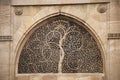 Carving details on the outer wall of the Sidi Sayeed Ki Jaali , Built in 1573, Ahmedabad, Gujarat, India Royalty Free Stock Photo