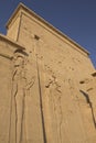 Carving of Egyptian god on pylon Royalty Free Stock Photo