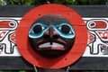 Carving face on a totem pole Royalty Free Stock Photo