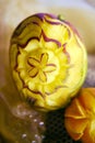 Carving with fruit-flower carved on mango for decoration Royalty Free Stock Photo