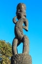 Maori wood carving. Standing figure on pole, Tauranga, New Zealand