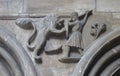 Carving of knight fighting lion inside English Cathedral church