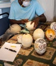 Carving ostrich eggs