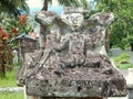 Carving pattern on the ancient stone grave of waruga