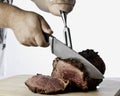 Carving a Prime Rib Royalty Free Stock Photo