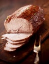 Carving roast meat for dinner Royalty Free Stock Photo