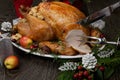 Carving Roasted Christmas Turkey with Grab Apples Royalty Free Stock Photo