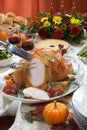 Carving Roasted Turkey on Harvest Table