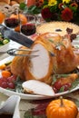 Carving Roasted Turkey on Harvest Table