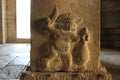 Carving of a strange figure, apparently cutting jackfruit in Vittala temple Royalty Free Stock Photo